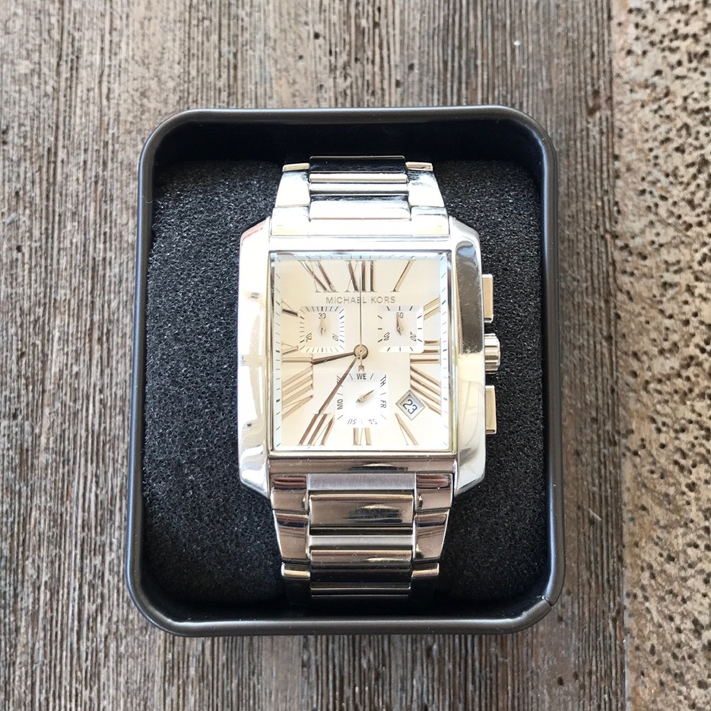 Michael Korda silver watch.